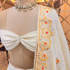Pure tissue lehenga with kacchi Patti hand work .