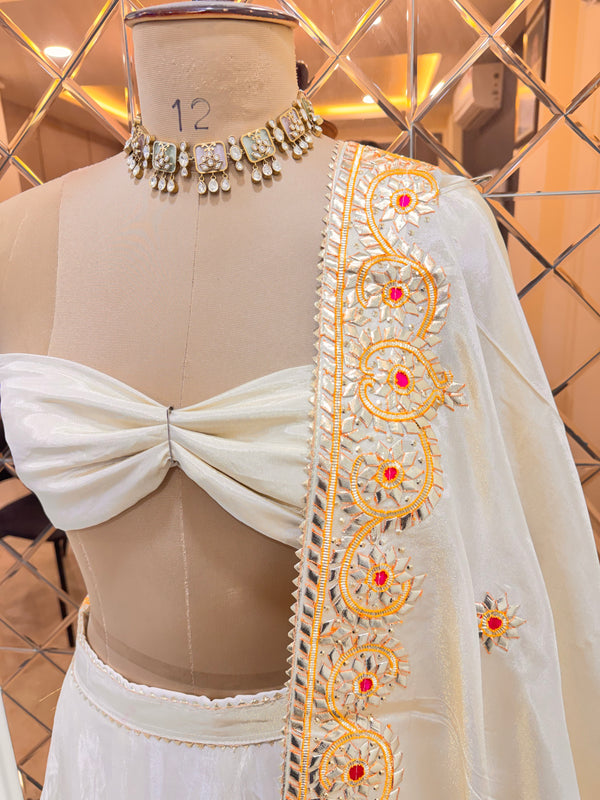 Pure tissue lehenga with kacchi Patti hand work .