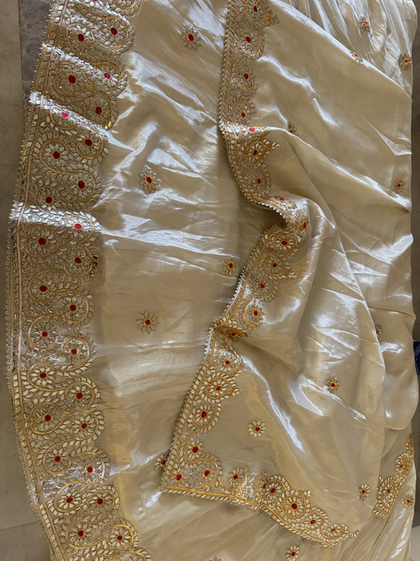 Pure tissue lehenga with kacchi Patti hand work .