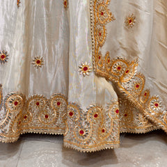 Pure tissue lehenga with kacchi Patti hand work .