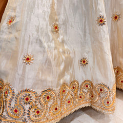 Pure tissue lehenga with kacchi Patti hand work .