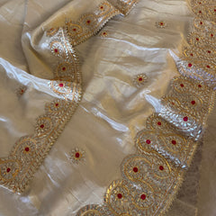 Pure tissue lehenga with kacchi Patti hand work .