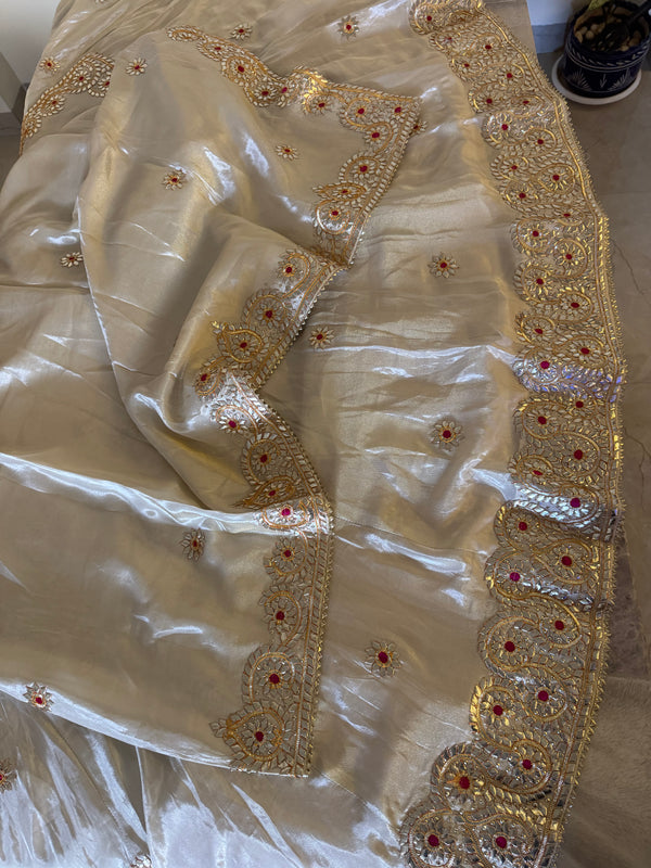 Pure tissue lehenga with kacchi Patti hand work .