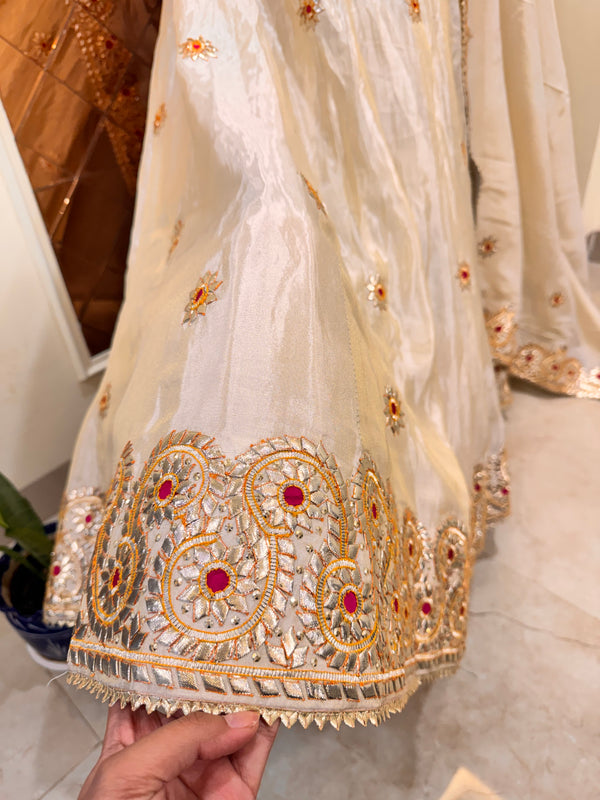 Pure tissue lehenga with kacchi Patti hand work .