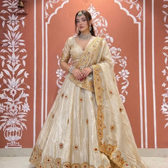 Pure tissue lehenga with kacchi Patti hand work .