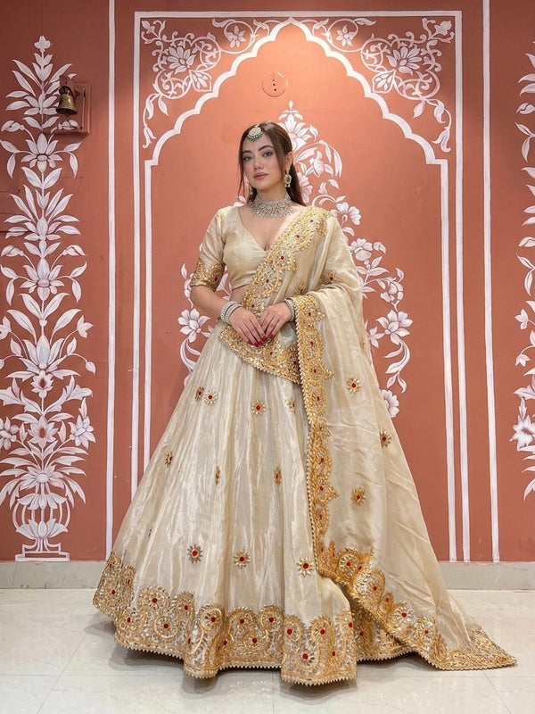 Pure tissue lehenga with kacchi Patti hand work .