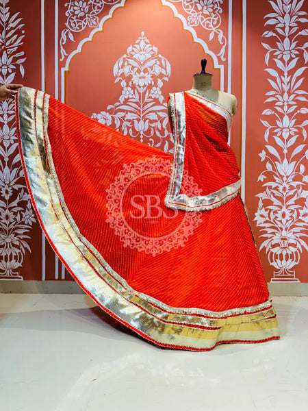 GEORGETTE GOLDEN SILVER WORK EXTRA FLARED LEHENGA Orange / Free Size