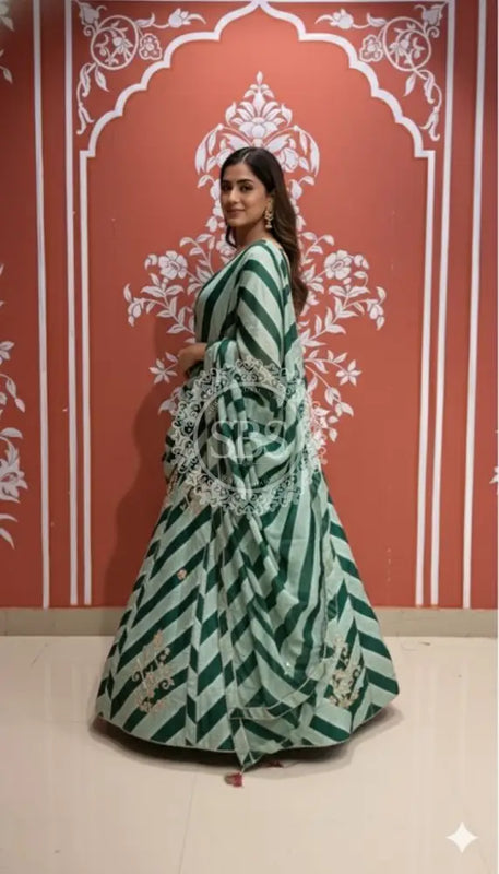 Pure Chinon leheriya lehenga with gota patti work