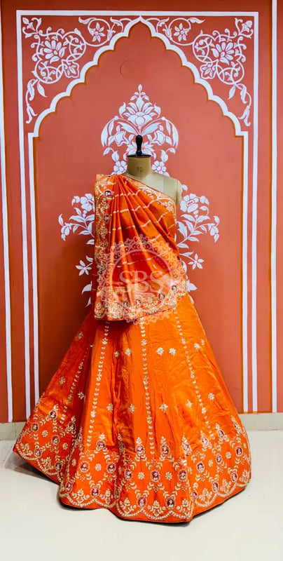 PURE COSMOS TISSUE HANDWORK GOTA PATTI LEHENGA Orange / Free Size