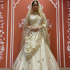 Pure tissue lehenga with kacchi Patti hand work. Off white / Free Size