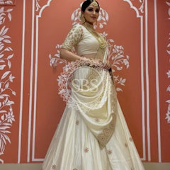 Pure tissue lehenga with kacchi Patti hand work. Off white / Free Size