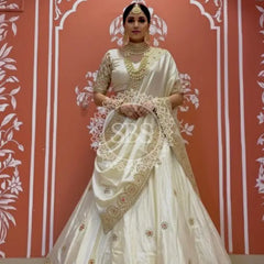 Pure tissue lehenga with kacchi Patti hand work. Off white / Free Size